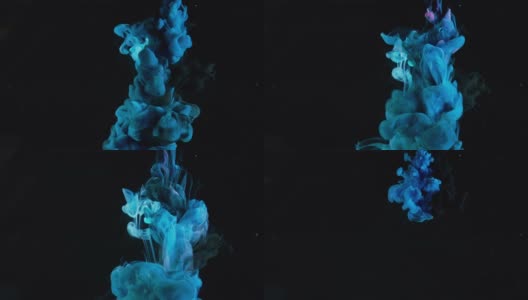 蓝色颜料滴与水混合的慢动作。资料片。平滑的墨水从水下旋转和溅起，在黑色背景上留下墨云高清在线视频素材下载