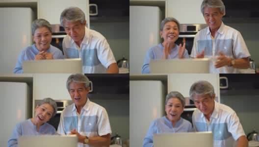 资深亚洲夫妇视频通话使用笔记本电脑高清在线视频素材下载