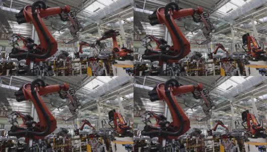在现代汽车工厂中机器人的自动操作，生产的自动化无需人工干预高清在线视频素材下载