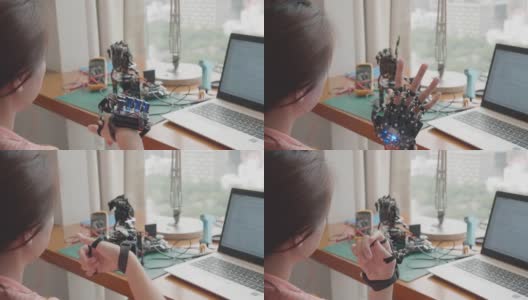 女工程师开发机器人手高清在线视频素材下载