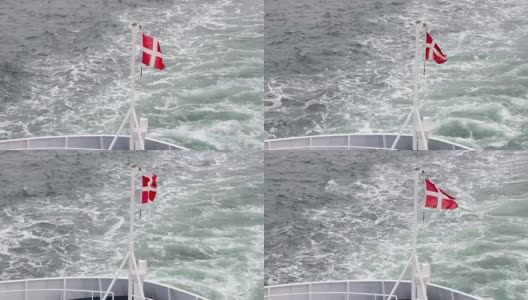 船上的丹麦国旗迎风飘扬高清在线视频素材下载
