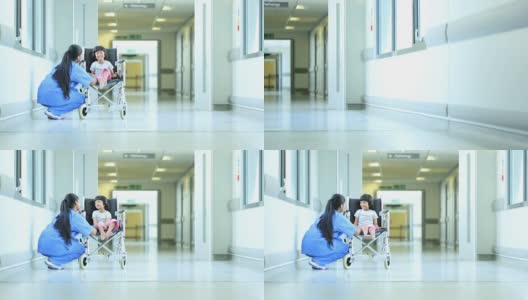 少数民族女护士安抚幼童病人高清在线视频素材下载