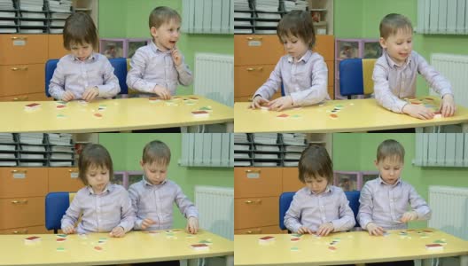 两个男孩在玩几何图形高清在线视频素材下载