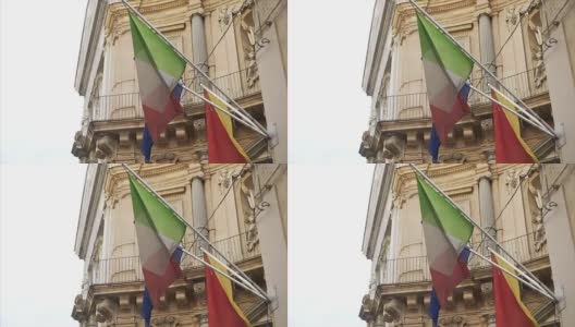 旧罗马建筑上的意大利国旗和欧盟国旗高清在线视频素材下载