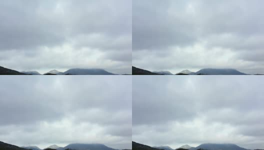 群山之上多云的天空高清在线视频素材下载