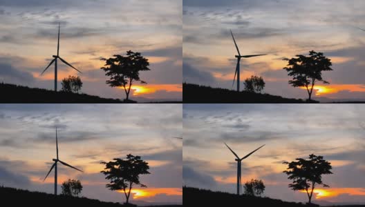 4K美丽的风力涡轮机在黄昏日落。农村玉米田可再生能源生产的概念高清在线视频素材下载