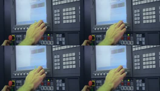在工厂生产机器的控制面板后面工作的人高清在线视频素材下载