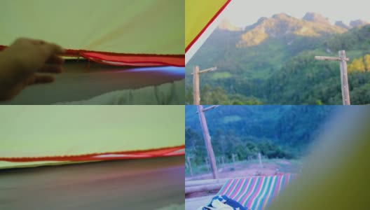 在假期的日落时分，手开帐篷，在山景外看风景高清在线视频素材下载