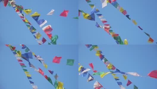 近距离观察:彩旗在斯瓦扬布纳特的秋风中飘扬。高清在线视频素材下载