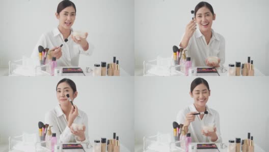 亚洲美丽的女人生活教学美容化妆在线。一个在工作室对着相机摆姿势的女人。美丽、时尚和化妆品的概念。高清在线视频素材下载