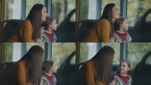 妈妈和女儿一起坐公共汽车高清在线视频素材下载