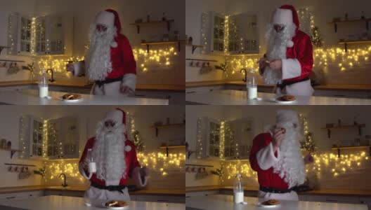 圣诞节快乐的圣诞老人在厨房跳舞高清在线视频素材下载