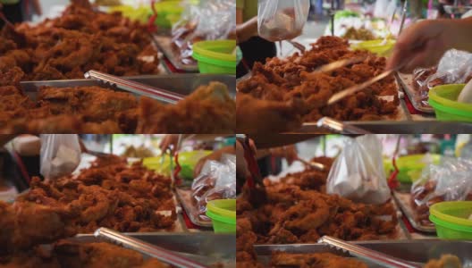 油炸鸡，泰式炸鸡在泰国北部的乡村食品市场高清在线视频素材下载