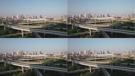 在阳光灿烂的日子里，看看城市里壮观的立体高架道路高清在线视频素材下载