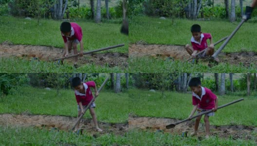 孩子们用铁锹挖土高清在线视频素材下载
