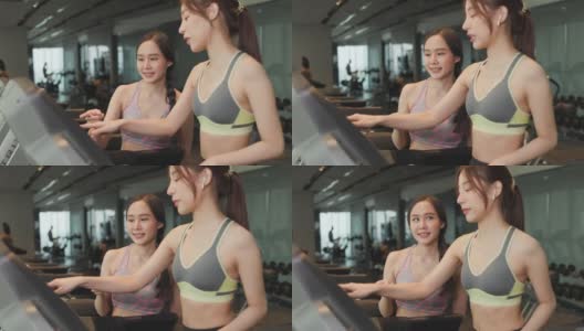 迷人的健身亚洲女性完成锻炼，并在训练后饮用蛋白质牛奶奶昔维生素。健身。健康的生活方式。高清在线视频素材下载