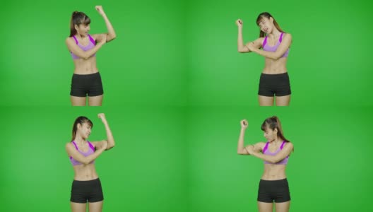 女人二头肌极度疼痛，绿屏，锻炼，运动事故，受伤。适合年轻的亚洲体育妇女穿着紫色的布在痛苦的锻炼在镜头前。高清在线视频素材下载