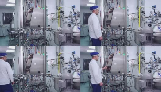药师控制制药设备在现代化的工厂高清在线视频素材下载