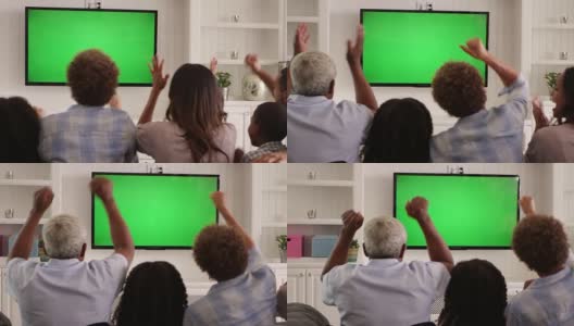 家庭观看R3D绿屏电视的后视图高清在线视频素材下载