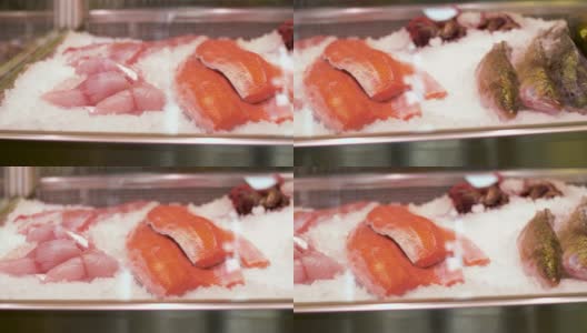 鱼店冰箱里的海鲜高清在线视频素材下载