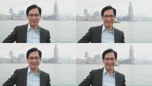 微笑的中国商人的大头照高清在线视频素材下载