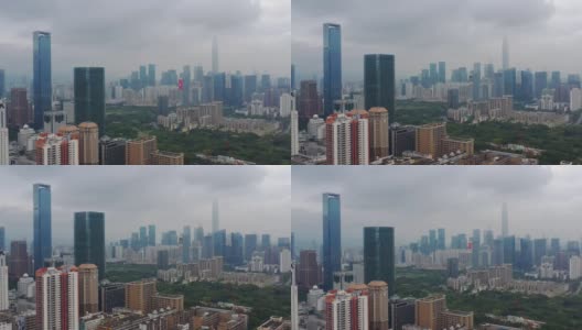 白天飞行在深圳城市景观市中心空中全景4k中国高清在线视频素材下载