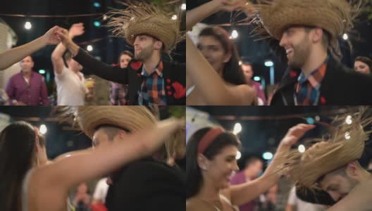 巴西年轻夫妇跳舞在一个arrayina，朱尼纳派对高清在线视频素材下载
