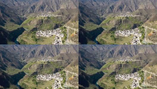 鸟瞰图上的村庄喜马拉雅山在中国云南高清在线视频素材下载