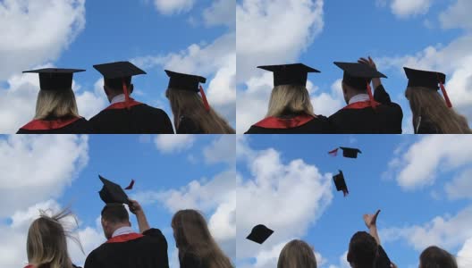 毕业生们的美好未来，三个学生将学术帽抛向空中高清在线视频素材下载