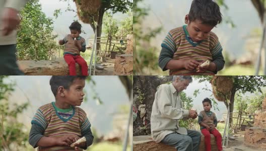 印度人给可怜的小孩喂食物。高清在线视频素材下载
