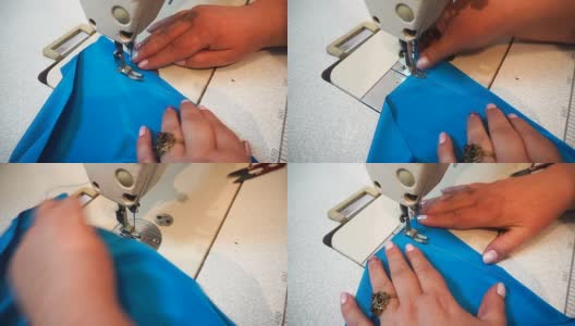 中年妇女在缝纫机上手工缝制蓝色织物高清在线视频素材下载