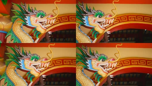 宗教色彩丰富的龙雕塑。神龛内装饰有中国传统风格的装饰物高清在线视频素材下载