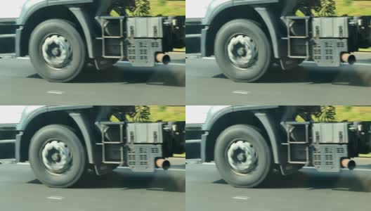 卡车轮胎在高速公路上行驶的4K特写镜头高清在线视频素材下载
