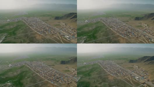 村庄和道路鸟瞰图，新疆，中国。高清在线视频素材下载