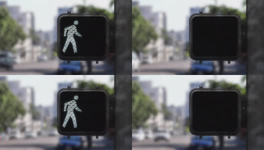 中镜头显示了行人步行信号从步行人物到不步行高清在线视频素材下载