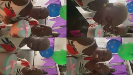 母亲和女儿在生日远程聚会上做视频通话-移动摄像头的POV高清在线视频素材下载