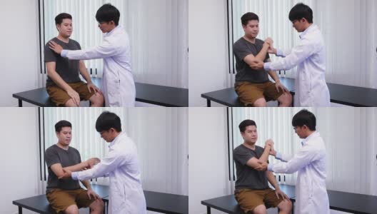 亚洲理疗师检查接受过矫形康复治疗的患者的肘部。高清在线视频素材下载
