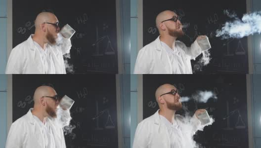 一位化学科学家把液氮放进嘴里进行实验，然后释放出白烟。化学秀，慢镜头高清在线视频素材下载
