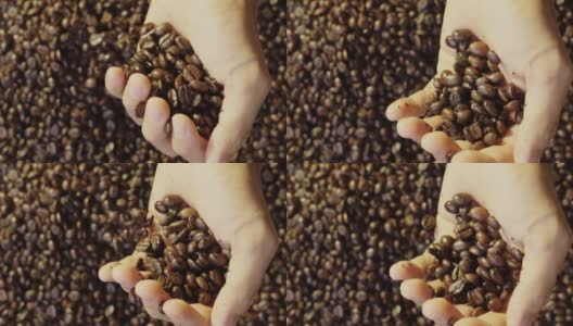 将手中的咖啡豆倒进咖啡粒堆的特写镜头高清在线视频素材下载