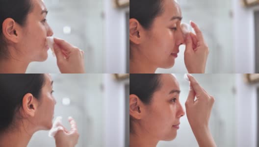 亚洲妇女清洁面部皮肤用清洁剂和保湿酒防腐剂高清在线视频素材下载