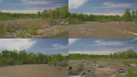加拉廷河蜿蜒穿过棉白杨河岸，在早春向北流向蒙大拿州的博兹曼高清在线视频素材下载