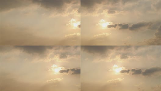 高清平移:傍晚的云和太阳。高清在线视频素材下载