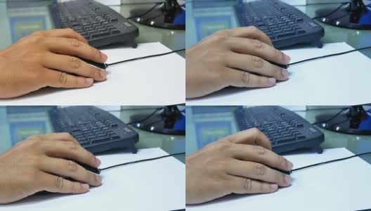 年轻女子使用电脑鼠标高清在线视频素材下载