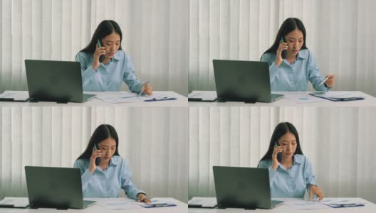 亚洲经理正在与一名员工通电话，对办公室错误的文书工作感到愤怒。高清在线视频素材下载
