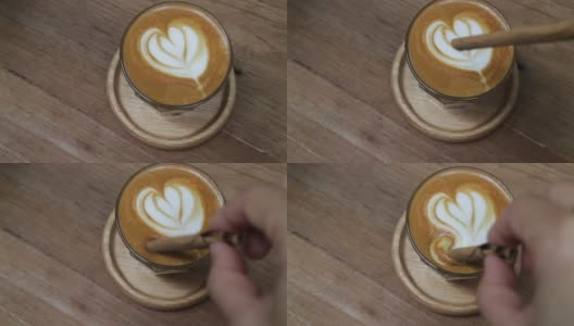 一杯有拿铁艺术的短笛拿铁咖啡高清在线视频素材下载