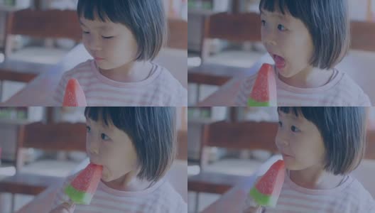 野餐:真正的亚洲孩子吃冰淇淋高清在线视频素材下载