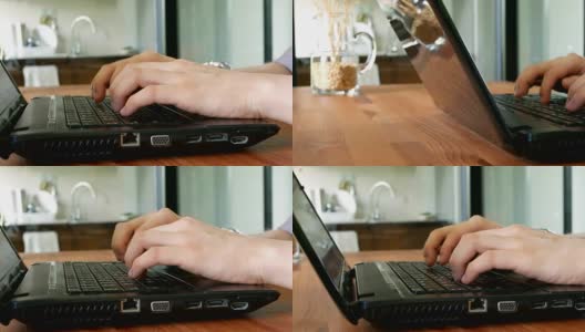 摄影:商人在笔记本电脑键盘上打字高清在线视频素材下载