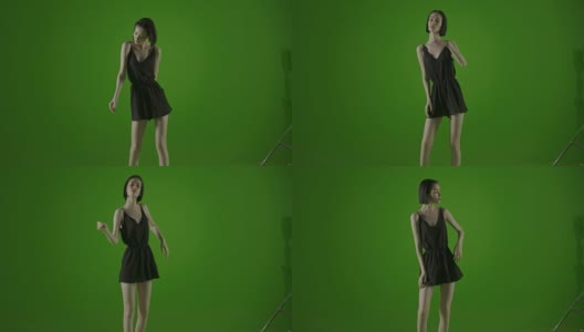 迷人的女孩，时尚模特，时尚性感的舞蹈在绿色的屏幕高清在线视频素材下载