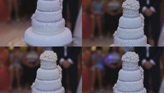 婚礼蛋糕是为相爱的夫妇切和吃准备的高清在线视频素材下载