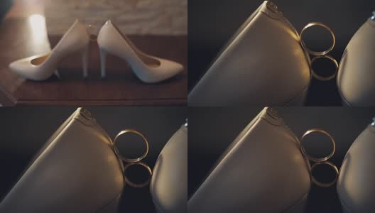 两个结婚戒指在结婚鞋之间高清在线视频素材下载